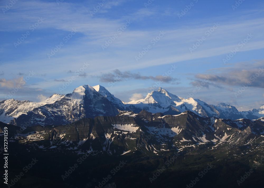 Obraz premium World famous mountain range Eiger, Monch and Jungfrau. View from Mount Brienzer Rothorn. Eiger North Face.