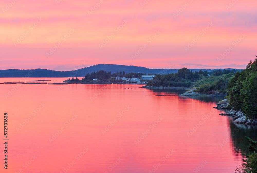 Bright sunset over Bay of Fundy and Campobello island, New Brunswick Atlantic coast, Canada
