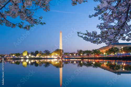 Washington Monument   Bureau of Engraving and Printing building  and Tidal Basin at sunrise during National Cherry Blossom Festival in Washington  DC  USA