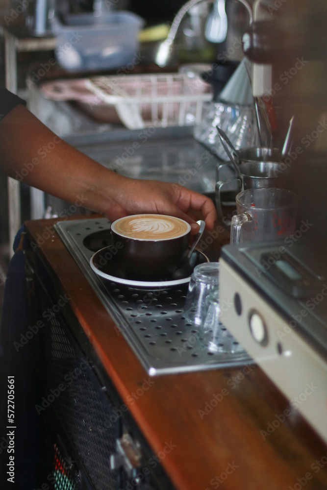 a cup of latte art in the coffee shop a cup of latte art in the coffee shop