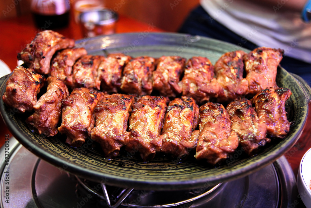 Korean barbecued pork ribs. Meat roasted on the grill.