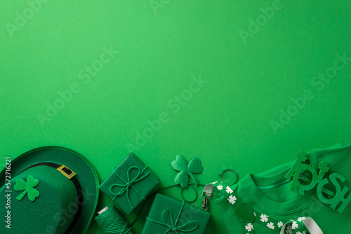 Saint Patrick's Day concept. Top view photo of green shirt leprechaun cap irish party glasses suspenders spool of twine gift boxes and clovers on isolated green background with empty space