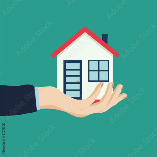 Hand holding house on mint background. Vector illustration. House for sale