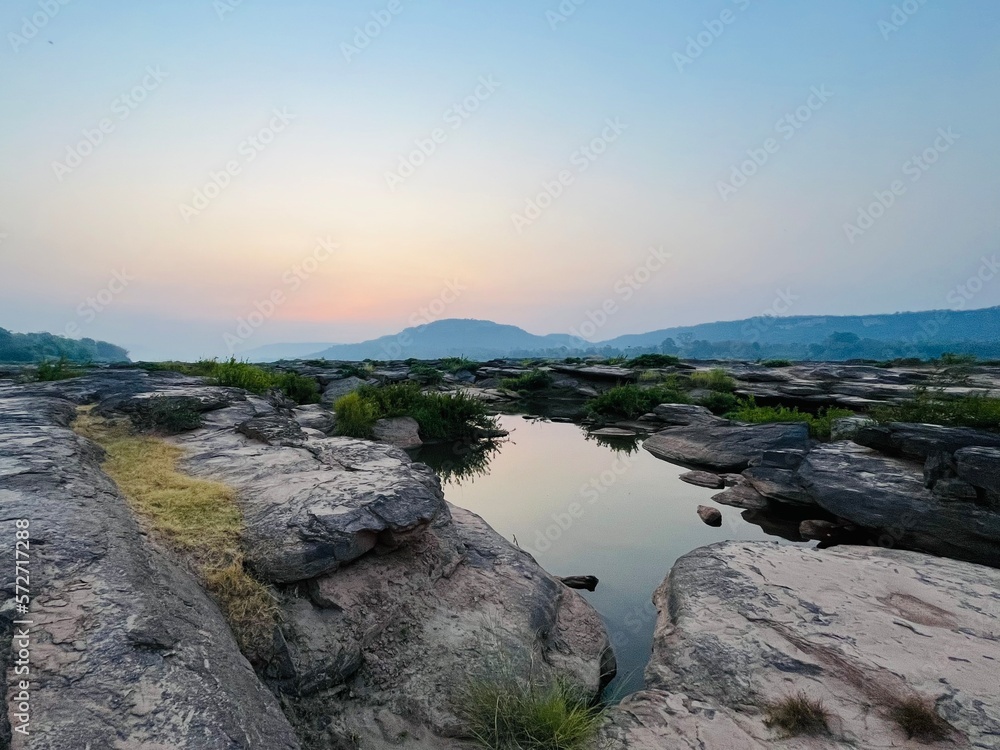 The scene of nature with canyon, river and mountain. A landscape of Khong river in Ubon Ratchathani province. View in the morning. The scene of nature with canyon, river and mountain. A landscape of Khong river in Ubon Ratchathani province. View in the morning.