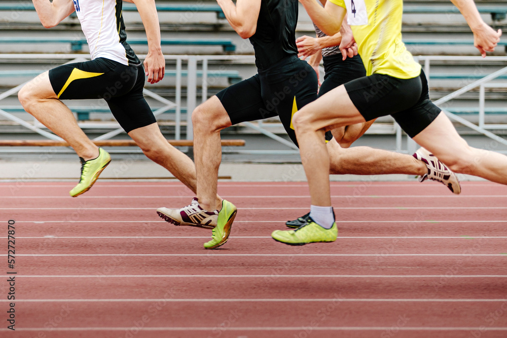 men athletes runners running race sprint in athletics