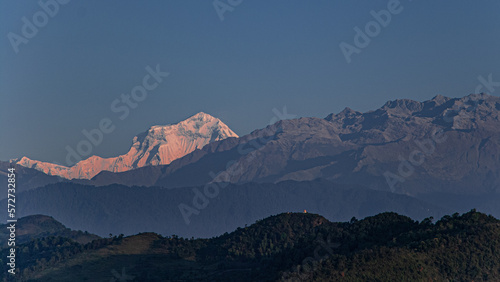 View of the Himalayan giants, Dhaulagiri mountain, Annapurna range and Machapuchare (Fish Tail) mountain as seen at sunrise from Sarangkot village, near Pokhara, Nepal Himalayas, Nepal © MoVia1