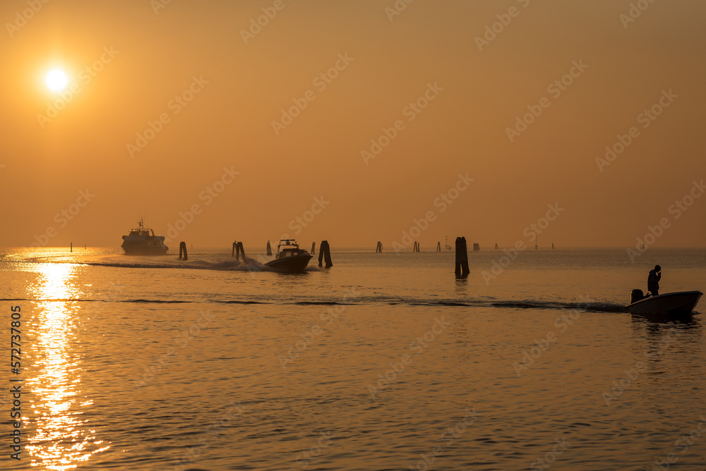 Sunset with boats on the water