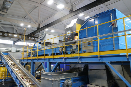 conveyors in the workshop of a waste sorting plant