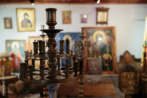 Orthodox church supplies. Candlesticks in an old church. Preparation for the rite of baptism in old Christian church