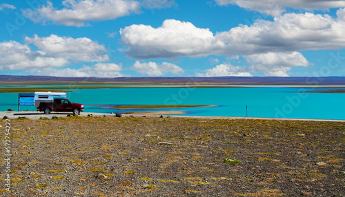 Beautiful icelandic natur landscape, blue turquoise reservoir lake, camper truck - Blöndulon, Iceland highlands photo