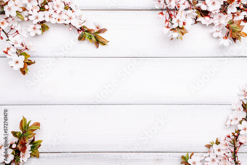 Spring border, April floral and spring blossom nature on wooden background. Branches of blossoming. Easter and spring greeting cards with copy space. Springtime.