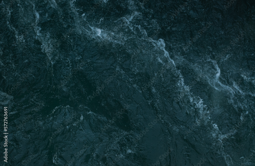 View on clear water of mountain river in Alps