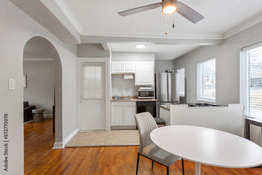 Fototapeta premium modern interior of a white apartment with open floor layout long term rental loft