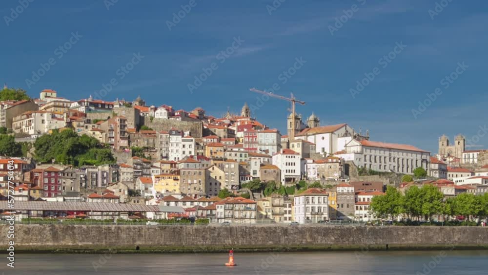 Douro River skyline from waterfront timelapse hyperlapse during sunset time in Porto, Portugal. Porto is one of the most popular tourist destinations in Europe Douro River skyline from waterfront timelapse hyperlapse during sunset time in Porto, Portugal. Porto is one of the most popular tourist destinations in Europe
