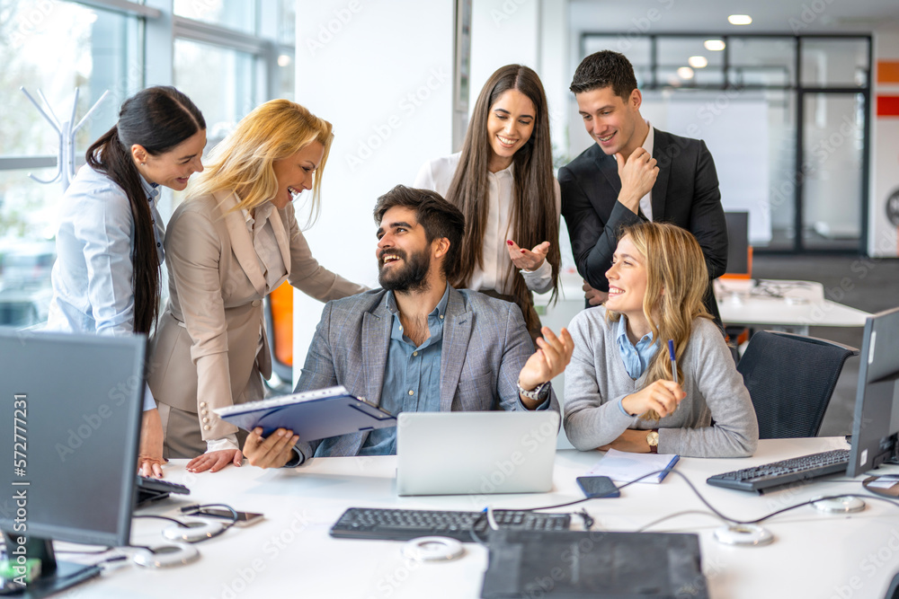 Large group of positive people around conference desk having a meeting with their executive CEO manager boss in modern office. Finance, business, conversation, company and cooperation concept. Large group of positive people around conference desk having a meeting with their executive CEO manager boss in modern office. Finance, business, conversation, company and cooperation concept.