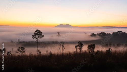 Thung Salaeng Luang National Park The sun over the mountains and vast grasslands  Phetchabun Province  Thailand