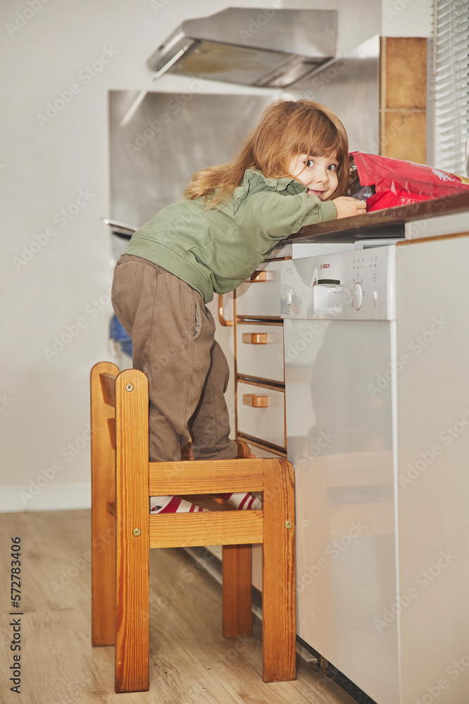 beautiful stealing potato chips in the kitchen beautiful stealing potato chips in the kitchen
