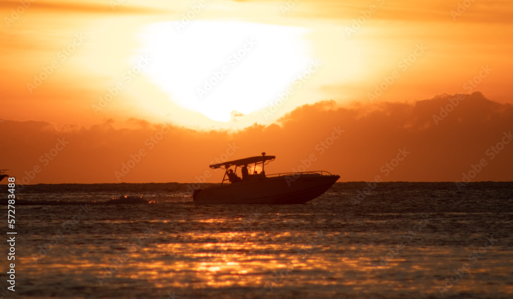 A boat in a sunset A boat in a sunset