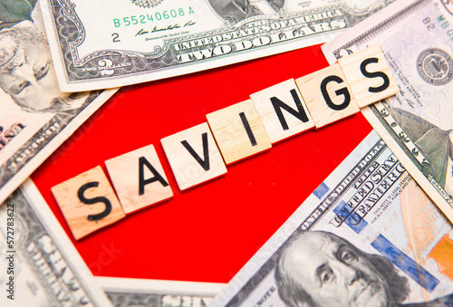 Savings inscription next to US dollars. American savings