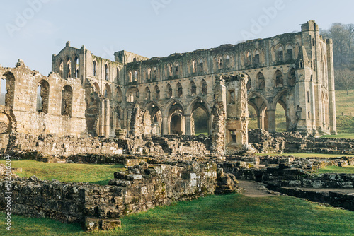 Ancient arches and pillars, part of Rievaulx Abbey in North Yorkshire. Religious monestary ruins.