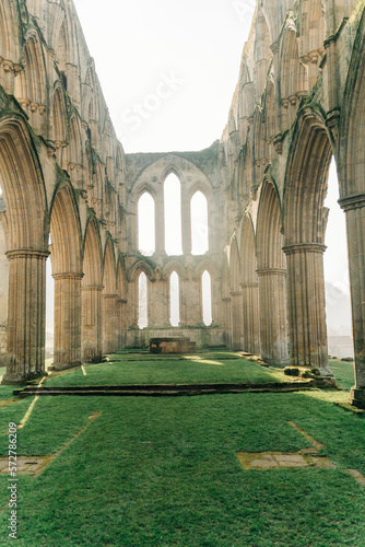 Ancient arches and pillars, part of Rievaulx Abbey in North Yorkshire. Religious monestary ruins.