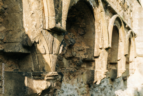 Ancient arches and pillars, part of Rievaulx Abbey in North Yorkshire. Religious monestary ruins.