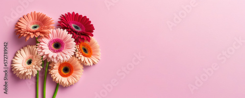 bouquet of gerberas on pink background top view flat banner - generative ai