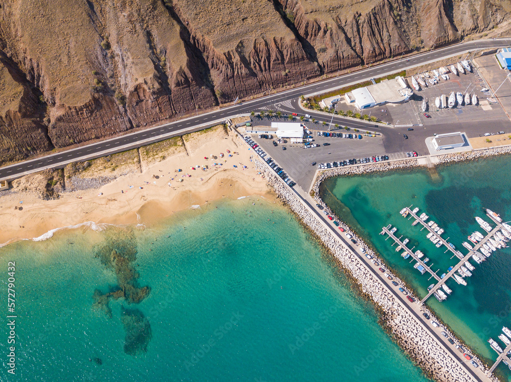 Bird's eye view of Porto Santo Island harbour and beach. Crystal clear sea and golden sand beach. Copy space.