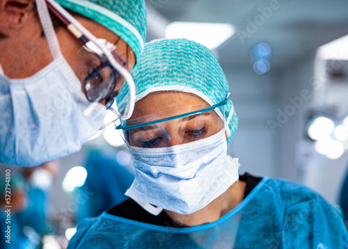 Surgeons practicing maxillofacial surgery in a simulation lab photo