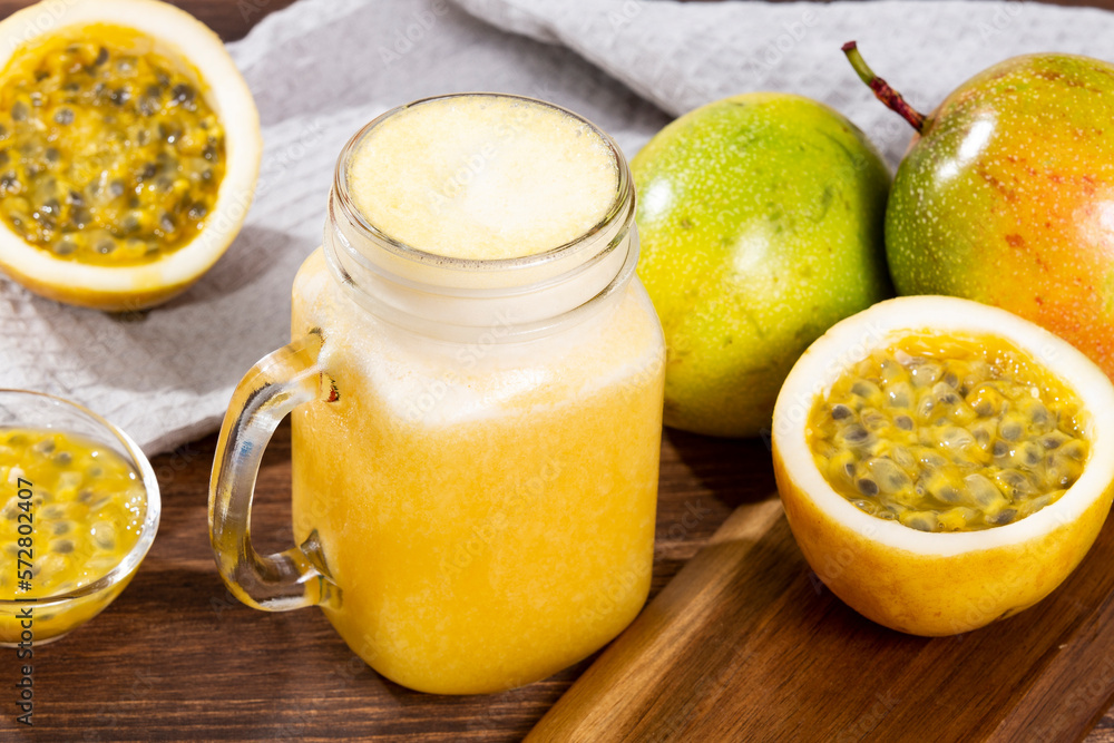 Tasty Passion Fruit Juice; Photo On Wooden Background Tasty Passion Fruit Juice; Photo On Wooden Background