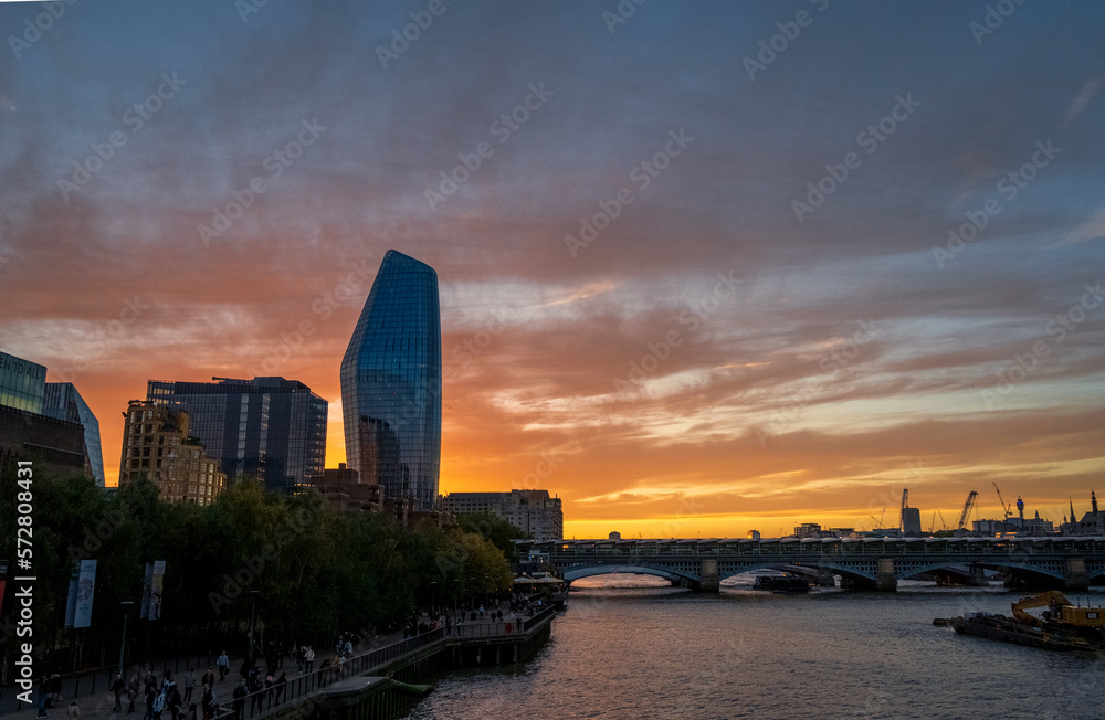 Sunset over London from the river Thames. United Kingdom.