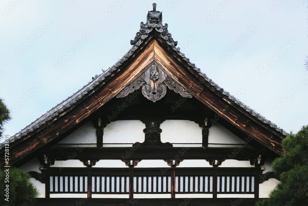 Detail of the top of a wooden temple in Kyoto, Japan