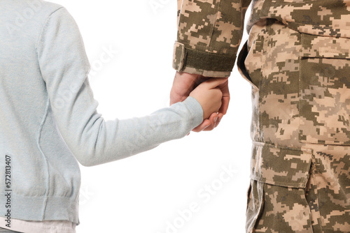 Soldier in Ukrainian military uniform and his daughter on white background, closeup. Family reunion