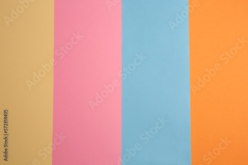 Colorful sheets of paper as background, top view