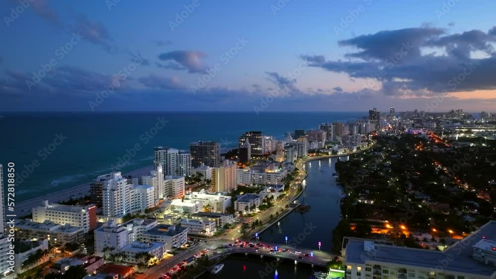 Aerial pull out video Miami Beach twilight to night Aerial pull out video Miami Beach twilight to night