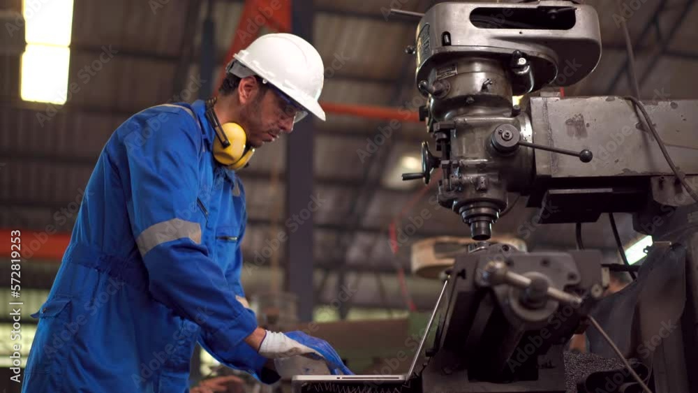 engineers inspecting a metal machine system the factory. engineers inspecting a metal machine system the factory.