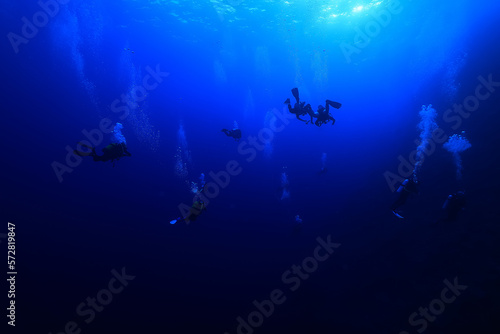 group of divers depth bubbles dive