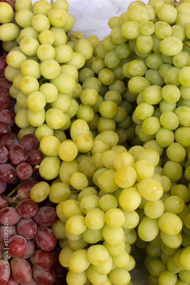 Green seedless grapes Assorted fresh fruits and vegetables in peruvian market