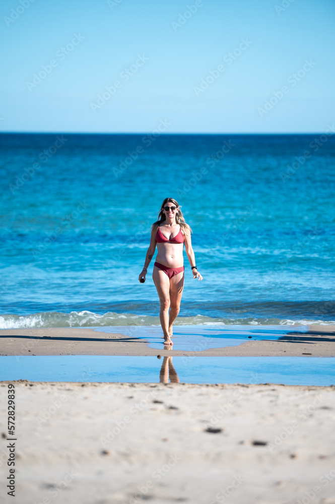 Pregnant woman on the beach of Alicante in Spain. Pregnant woman on the beach of Alicante in Spain.