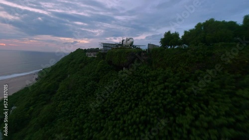 Abandoned aeroplane of Mandala Airlines PK-RII at the top of a cliff in Badung at the Indonasian island Bali. FPV drone shot photo