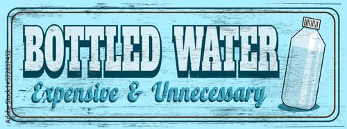 Bottled water expensive and unnecessary sign on wood