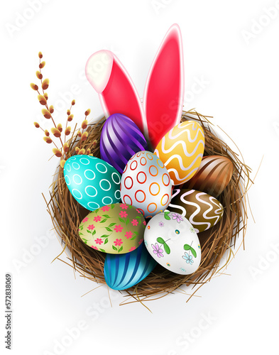 Easter eggs in a nest, rabbit ears and a willow branch.