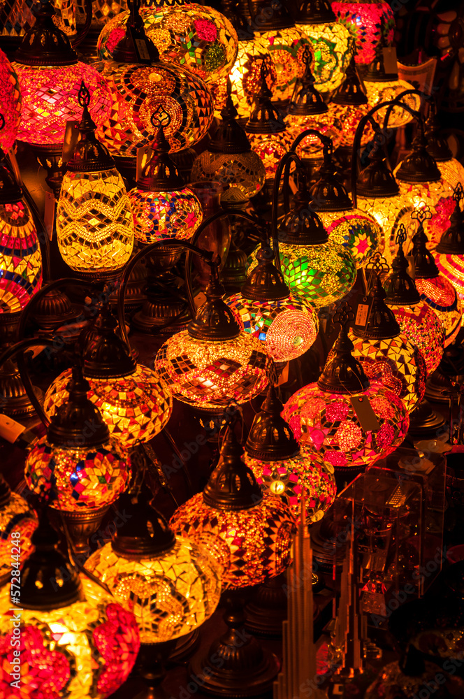 Close up of beautiful illuminated decorative hanging lamps. Many Turkish hanging lamps selling in the famous Grand Bazaar market. 
