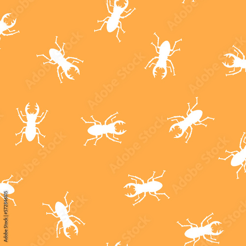 Seamless pattern with simple silhouettes of stag beetles 