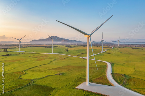Panoramic view of wind farm or wind park, with high wind turbines for generation electricity with copy space. Green energy concept. Ninh Thuan, Vietnam