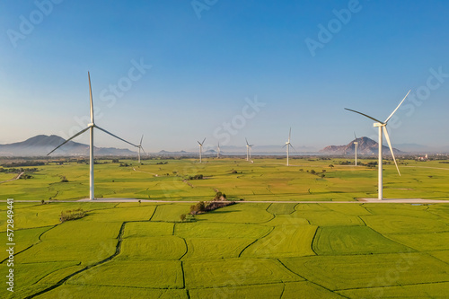 Panoramic view of wind farm or wind park, with high wind turbines for generation electricity with copy space. Green energy concept. Ninh Thuan, Vietnam
