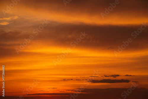 Beautiful colorful dramatic sky with clouds at sunset or sunrise. Abstract sky background © es0lex