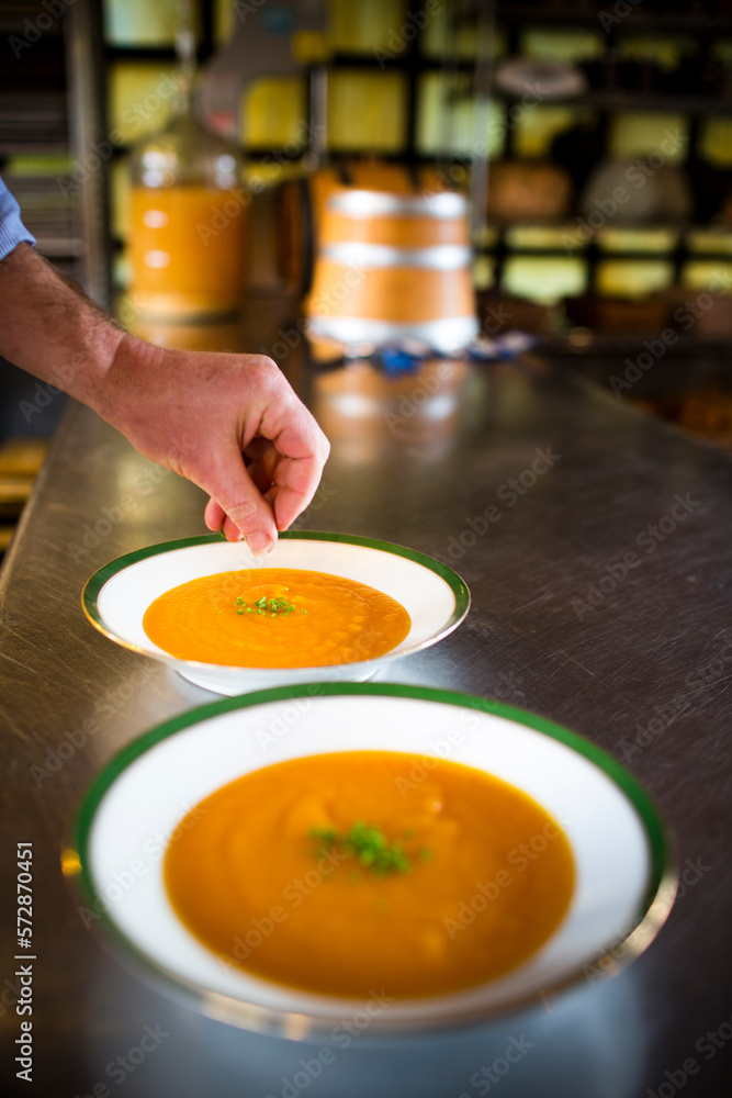 A well-known chef makes homemade soup in his kitchen on an island off the coast of Seattle, WA. A well-known chef makes homemade soup in his kitchen on an island off the coast of Seattle, WA.
