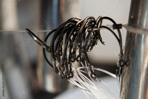 A group of fish hooks with lines are prepared for a day on the water. photo