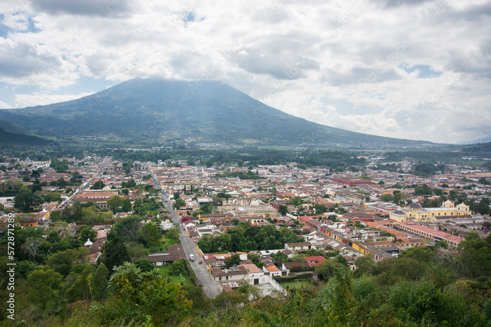 Birds eye view of an overcast Antigua, Guatemala, from the Cerro de la Cruz, with the Volcan de Agua covered by clouds. Birds eye view of an overcast Antigua, Guatemala, from the Cerro de la Cruz, with the Volcan de Agua covered by clouds.